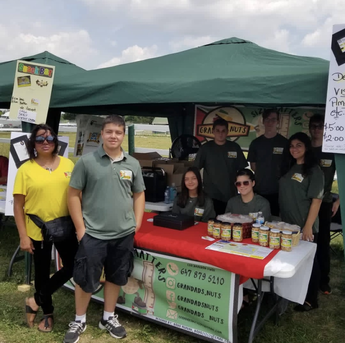 The family behind Grandad's Nuts at their market stand